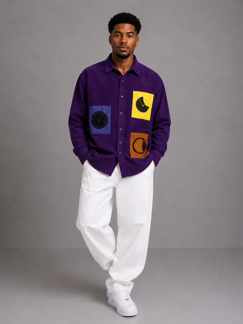 A Moontian in the purple moon-phase patch shirt and white trousers